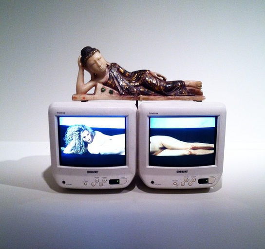 Nam-June-Paik-Reclining-Buddha-1994-via-Art-Observed.png